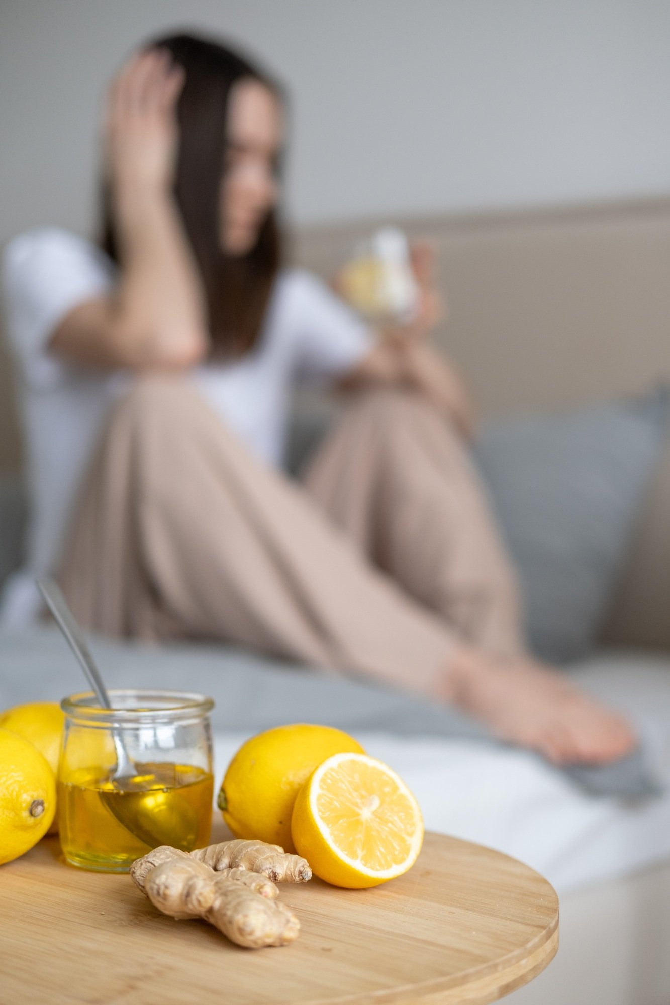 Sick girl in bed in the background